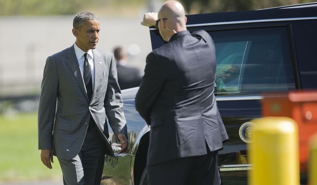 President Barack Obama walks to the presidential limousines after stepping off Marine One at Walter Reed National Military Medical Center in Bethesda, Md., Wednesday, April 29, 2015, for a visit with wounded military personnel. (AP Photo/Pablo Martinez Monsivais)