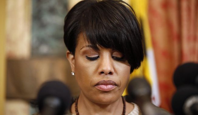 Mayor Stephanie Rawlings-Blake pauses while speaking during a media availability at City Hall, after violence occurred after a march for Freddie Gray, Saturday, April 25, 2015 in Baltimore. Gray died from spinal injuries about a week after he was arrested and transported in a police van. (AP Photo/Alex Brandon)