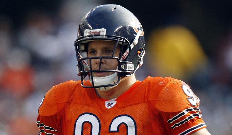 In this Nov. 1, 2009, file photo, Chicago Bears linebacker Hunter Hillenmeyer gets ready during an NFL football game against the Cleveland Browns in Chicago. The Ohio Supreme Court has found unconstitutional the method that Cleveland uses for taxing professional athletes who work for short periods of time in the city. (AP Photo/Nam Y. Huh, File)
