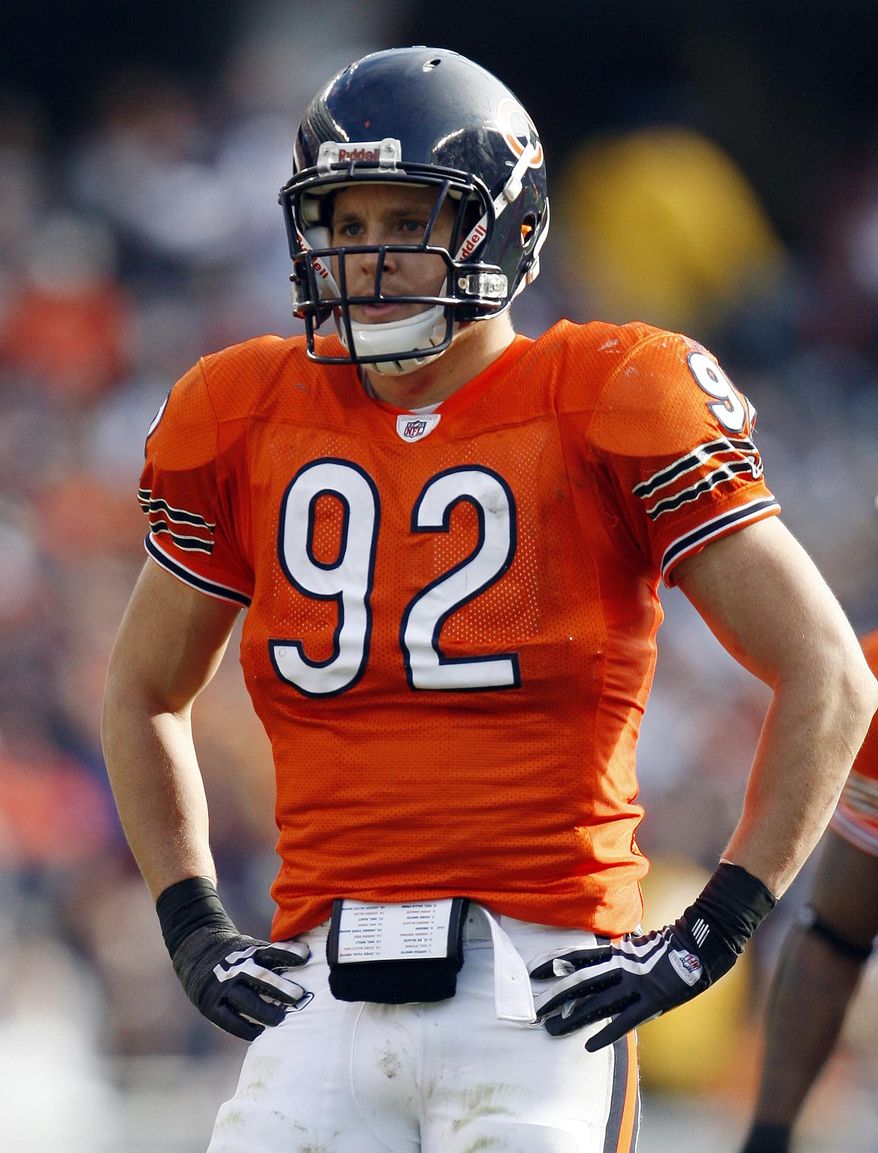 In this Nov. 1, 2009, file photo, Chicago Bears linebacker Hunter Hillenmeyer gets ready during an NFL football game against the Cleveland Browns in Chicago. The Ohio Supreme Court has found unconstitutional the method that Cleveland uses for taxing professional athletes who work for short periods of time in the city. (AP Photo/Nam Y. Huh, File)