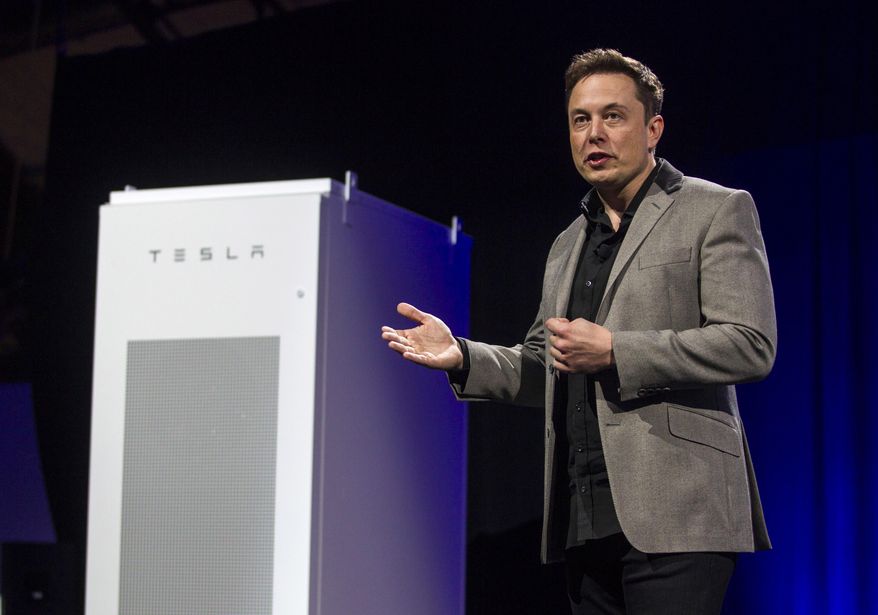 Elon Musk, CEO of Tesla Motors Inc., unveils the company’s newest product, Powerpack in Hawthorne, Calif., Thursday, April 30, 2015.  (AP Photo/Ringo H.W. Chiu)