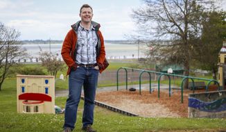 In this April 24, 2014 photo, Matthew Zedwick stands at Tapiola Park in Astoria, Ore. Tapiola Park received a nearly $4,000 grant from the Land and Water Conservation Fund in 1972 for park improvements. Zedwick and five other veterans with the Vet Voice Foundation took a trip to Washington D.C. in April to meet with Oregon senators to discuss reauthorizing the Land and Water Conservation Fund. (Joshua Bessex/Daily Astorian via AP)