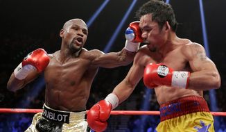 There were lots of angry people who were $100 lighter after watching Floyd Mayweather Jr.&#x27;s (left) victory Saturday night over Manny Pacquiao. (Associated Press)