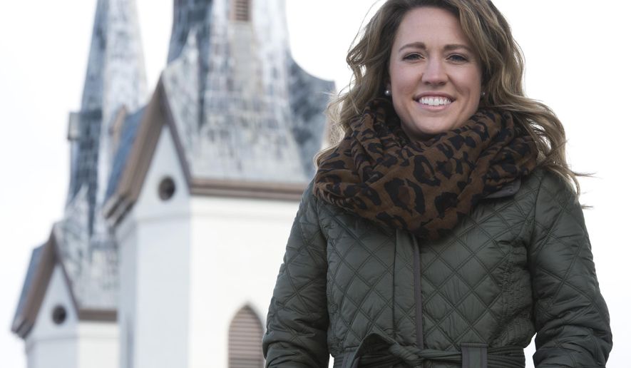 In this March 28, 2015 photo, Brooke Winn poses in Frederick, Md. The 24-year-old believes more young people should be interested and involved in politics, especially locally. The point of her new blog, The Clustered Spires Conservative at www.brookewinn.com, is to get the conversation started, and to keep people updated on current political issues and laws, mostly at the local level. (Graham Cullen/The Frederick News-Post via AP)
