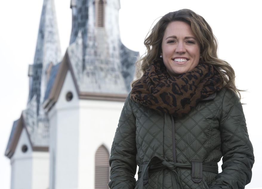 In this March 28, 2015 photo, Brooke Winn poses in Frederick, Md. The 24-year-old believes more young people should be interested and involved in politics, especially locally. The point of her new blog, The Clustered Spires Conservative at www.brookewinn.com, is to get the conversation started, and to keep people updated on current political issues and laws, mostly at the local level. (Graham Cullen/The Frederick News-Post via AP)