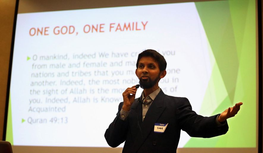 In this Saturday, May 2, 2015 photo, Dr. Sabeel Ahmed, of Chicago, talks about Islam during his presentation at an educational forum on the religion in Marshfield, Wis. The Islamic Society of Central Wisconsin wants to build a mosque in the Wausau area to help meet the growing number of worshippers. (Dan Young/The Marshfield News-Herald via AP) NO SALES