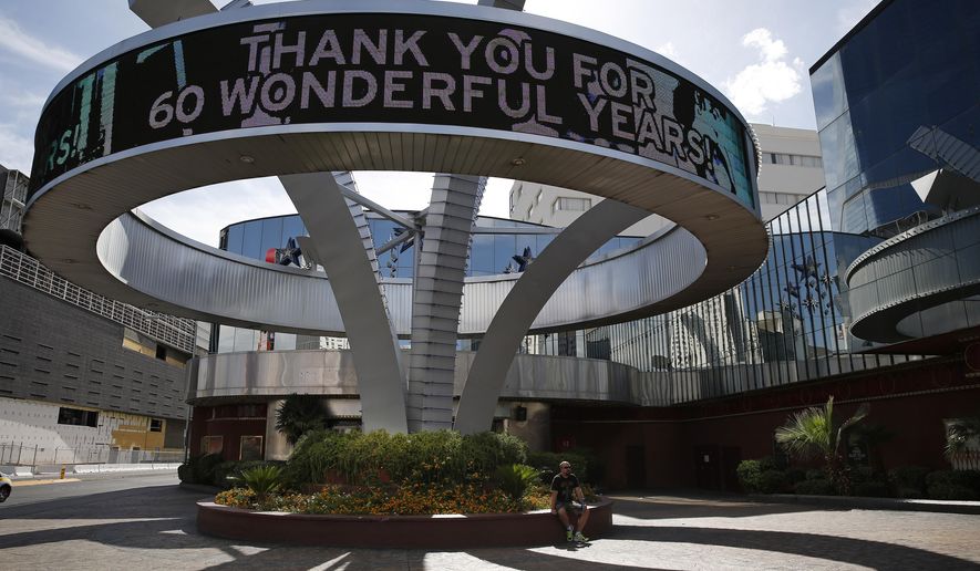 A sign thanks customers outside of the Riviera hotel and casino Monday, May 4, 2015, in Las Vegas. The casino will close down at noon on Monday. (AP Photo/John Locher)