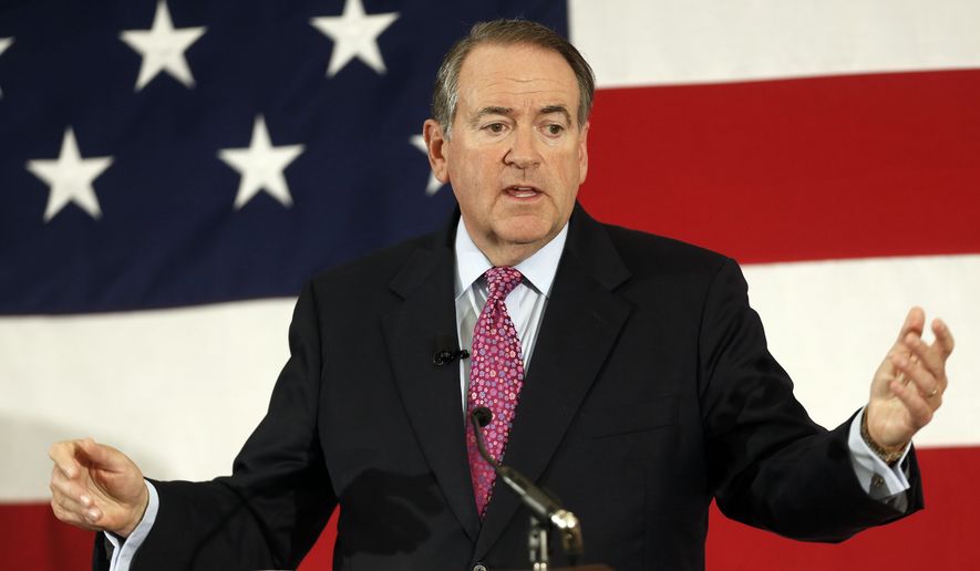 FILE - In this April 18, 2015 file photo, former Arkansas Republican Gov. Mike Huckabee speaks at the Republican Leadership Summit in Nashua, N.H. Huckabee is set to announce he will seek the 2016 Republican presidential nomination. He has an event planned for May 5 in his hometown of Hope, Ark., where former President Bill Clinton was also born.  (AP Photo/Jim Cole, File)