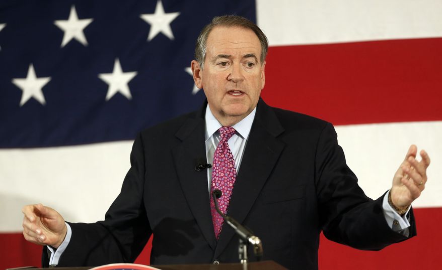 FILE - In this April 18, 2015 file photo, former Arkansas Republican Gov. Mike Huckabee speaks at the Republican Leadership Summit in Nashua, N.H. Huckabee is set to announce he will seek the 2016 Republican presidential nomination. He has an event planned for May 5 in his hometown of Hope, Ark., where former President Bill Clinton was also born.  (AP Photo/Jim Cole, File)