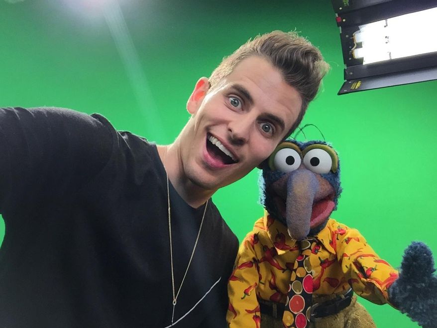 This photo provided by YouTube Space LA shows, Mike Tompkins, left, and Gonzo of the Muppets. The Muppets are appearing in skits and other online videos with several YouTube stars, including Tompkins, Lindsey Stirling and John and Hank Green. YouTube is celebrating its 10th anniversary through the month of May 2015. (YouTube Space LA via LA)