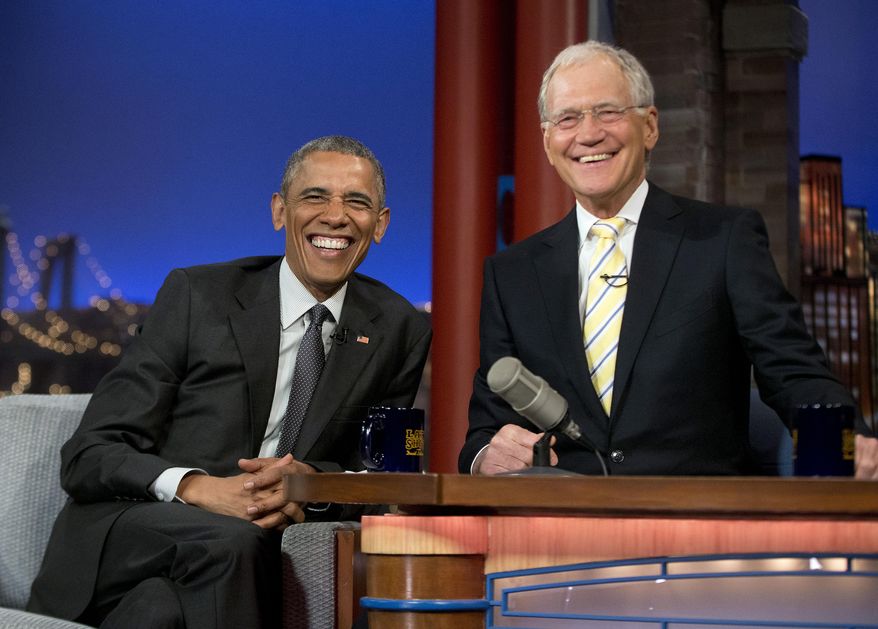 President Barack Obama with host David Letterman smile during a break at a taping of CBS The Late Show with David Letterman at the Ed Sullivan Theater in New York, Monday, May 4, 2015. (AP Photo/Pablo Martinez Monsivais)