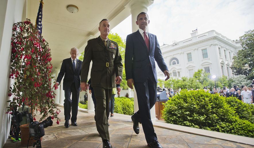 President Barack Obama walks with Marine Gen. Joseph Dunford Jr., his nominee to be the next chairman of the Joint Chiefs of Staff, after speaking in the Rose Garden of the White House in Washington, Tuesday, May 5, 2015. Obama chose the widely respected, combat-hardened commander who led the Afghanistan war coalition during a key transitional period during 2013-2014 to succeed Army Gen. Martin Dempsey. Walking behind them is Vice President Joe Biden. (AP Photo/Pablo Martinez Monsivais)