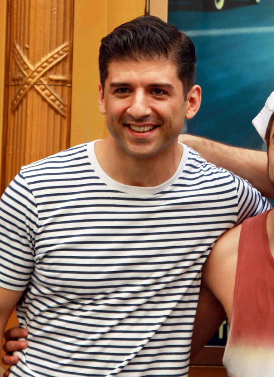 FILE - In this Sept. 5, 2014 file photo, Tony Yazbeck, star of the Broadway musical “On the Town” poses outside the Lyric Theatre in New York. Producers of the revival said Tuesday, May 5, 2015, that Yazbeck, who earned a nomination playing Gabey,” will star in select cities when the national tour gets underway in 2016. (AP Photo/Mark Kennedy, File)