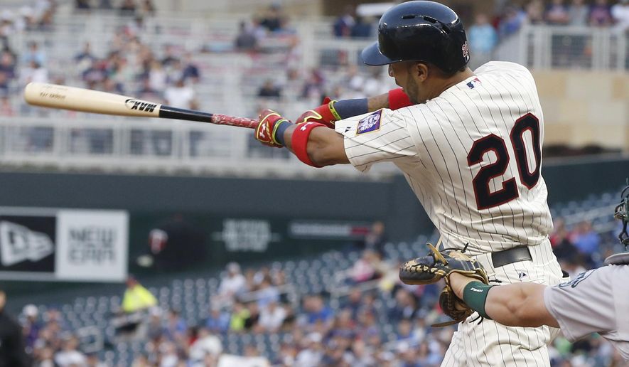 Minnesota Twins&#39; Eddie Rosario hits his first major league home run on the first pitch off Oakland Athletics pitcher Scott Kazmir in the third inning of a baseball game, Wednesday, May 6, 2015, in Minneapolis. (AP Photo/Jim Mone)