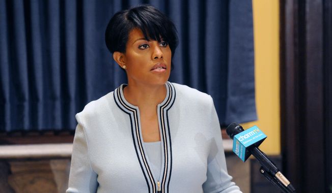 Mayor Stephanie Rawlings-Blake holds a news conference on Wednesday, May 6, 2015, in Baltimore.  The mayor called on U.S. government investigators to look into whether this city&#x27;s beleaguered police department uses a pattern of excessive force or discriminatory policing. (Kim Hairston/The Baltimore Sun via AP)  WASHINGTON EXAMINER OUT
