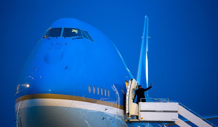 President Barack Obama waves goodbye as he boards Air Force One for departure from RAF Station Fairford in Gloucestershire, England, en route to Joint Base Andrews, Md., Sept. 5, 2014. (Official White House Photo by Pete Souza)