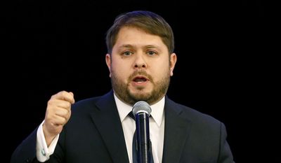 Rep. Ruben Gallego. D-Ariz., gives his victory speech in Phoenix. Two dozen House conservatives are threatening to oppose a sweeping defense policy bill over a non-binding provision aimed at allowing immigrants brought illegally to this country as kids to serve in the military. They say that the amendment by Gallego, &quot;contradicts the House&amp;#8217;s previous position and is a severe threat to passage&quot; of the $612 billion defense policy bill. (AP Photo/Matt York, File)