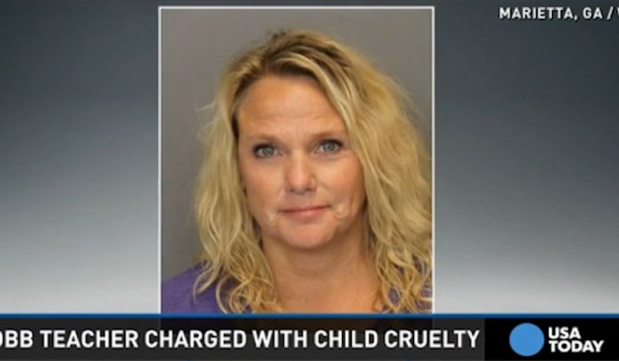 Mary Katherine Pursley, a special education teacher at Mt. Bethel Elementary, has been charged with cruelty to children after she allegedly put an autistic boy in a trash can and called him &quot;Oscar the Grouch.&quot; (USA Today)