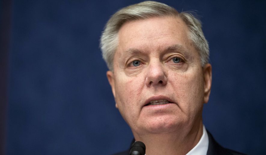 In this March 12, 2015 file photo, Sen. Lindsey Graham, R-S.C., speaks on Capitol Hill in Washington. Republican senators eyeing the presidency split over the renewal of the Patriot Act surveillance law, with civil libertarians at odds with traditional defense hawks who back tough spying powers in the fight against terrorism. (AP Photo/Manuel Balce Ceneta, File)
