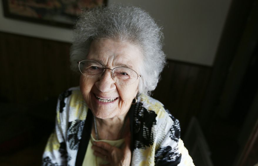 Mary Perez, 95, of Virginia Beach, VA, sits for a portrait in her home on Wednesday, April 29, 2015. Mrs. Perez was a riveter for one of the largest aircraft manufacturers in the United States during World War II. Her memories of those years resurfaced recently when she heard about the death of the model for artist Norman Rockwell's "Rosie the Riveter." (Steve Earley /The Virginian-Pilot via AP) MAGS OUT