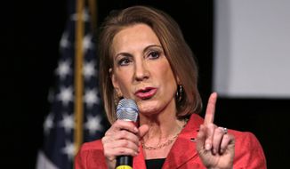Republican presidential candidate Carly Fiorina, the former Hewlett-Packard chief executive, gestures during her address at an N.H. High Tech Council event in Manchester, N.H., Friday, May 8, 2015. (AP Photo/Charles Krupa)