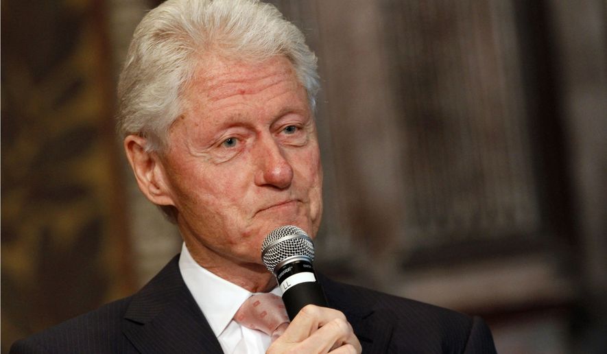 Former President Bill Clinton listens to a question after speaking at Georgetown University in Washington in this April 21, 2015, file photo. (AP Photo/Jacquelyn Martin, File)