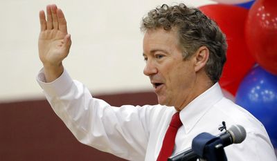 Republican presidential hopeful Sen. Rand Paul, R-Ky., waves to supporters at a rally after speaking at Arizona State University Friday, May 8, 2015, in Tempe, Ariz. (AP Photo/Ross D. Franklin)