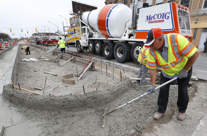 Road construction is shown in Detroit in this file photo from Tuesday, May 5, 2015. On Monday, March 4, 2019, Business Leaders for Michigan released a report Monday calling for tax increases to boost road funding in the Wolverine State (AP Photo/Paul Sancya) **FILE**