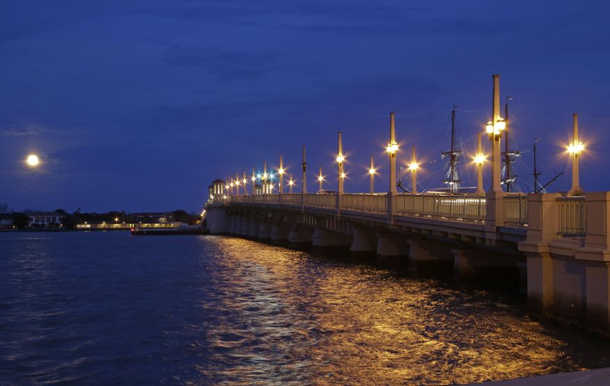 In this Tuesday, Feb. 3, 2015 photo, cars travel on the Bridge of Lions, to and from St. Augustine, Fla., over the Matanzas River. (AP Photo/John Raoux)