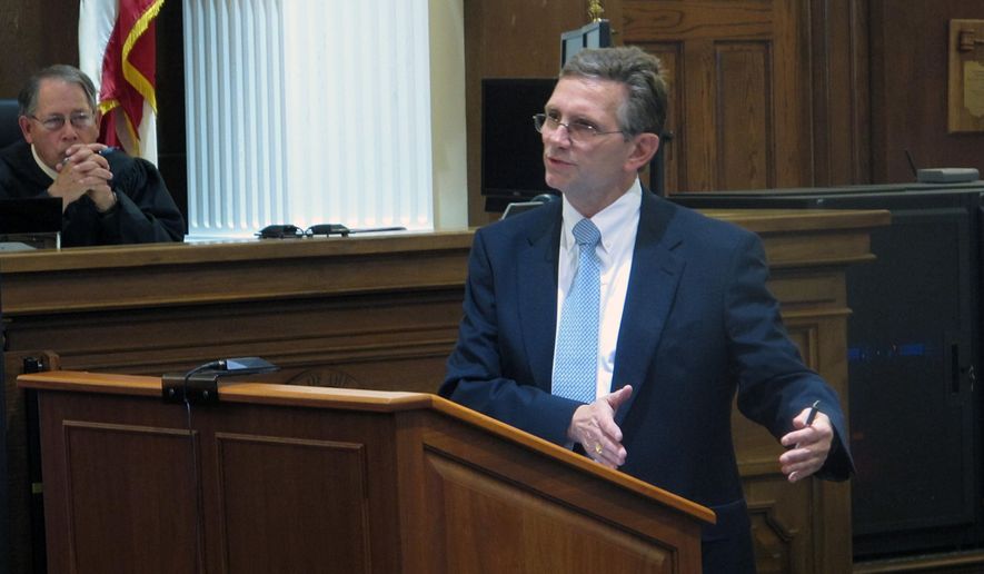 Defense attorney George Leach, right, defends his client against Union County charges of sexually assaulting three adopted daughters and his stepdaughter, as Judge David Faulkner observes, on Monday, May 11, 2015, in Marysville, Ohio. Leach says the defendant, an Ohio National guardsman, is innocent of charges including rape and sexual battery. (AP Photo/Andrew Welsh-Huggins)