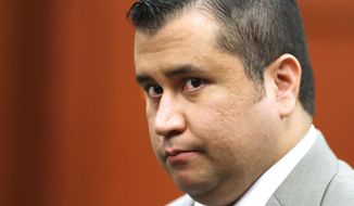 In this July 9, 2013, file photo, George Zimmerman leaves the courtroom for a lunch break his trial in Seminole Circuit Court, in Sanford, Fla. Police officers in Florida say Zimmerman has been involved in a shooting, Monday, May 11, 2015. Zimmerman was acquitted in 2013 of fatally shooting Trayvon Martin, an unarmed black teenager, in a case that sparked protests and national debate about race relations. (Joe Burbank/Orlando Sentinel via AP, Pool, File)