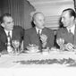 Walter Duranty, New York Times correspondent, center, at a luncheon given in his honor by the Association of Foreign Press Correspondents at the Hotel Lombardy in New York, April 16, 1936.  At left is Kenneth Durant, representative of TASS, Soviet news agency, and at right is A. Bernard Moloney, of Reuters, president of the association. (AP Photo/John Rooney)