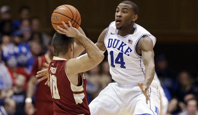 FILE - In this Jan. 3, 2015, file photo, Duke&#x27;s Rasheed Sulaimon (14) guards Boston College&#x27;s Steve Perpiglia during an NCAA college basketball game in Durham, N.C. Former Duke guard Rasheed Sulaimon will play his final season at Maryland. Coach Mark Turgeon announced the addition of Sulaimon on Monday, May 11, 2015, . The Houston native said on Twitter that he is &amp;#8220;blessed and honored for the opportunity.&amp;#8221;(AP Photo/Gerry Broome, File)