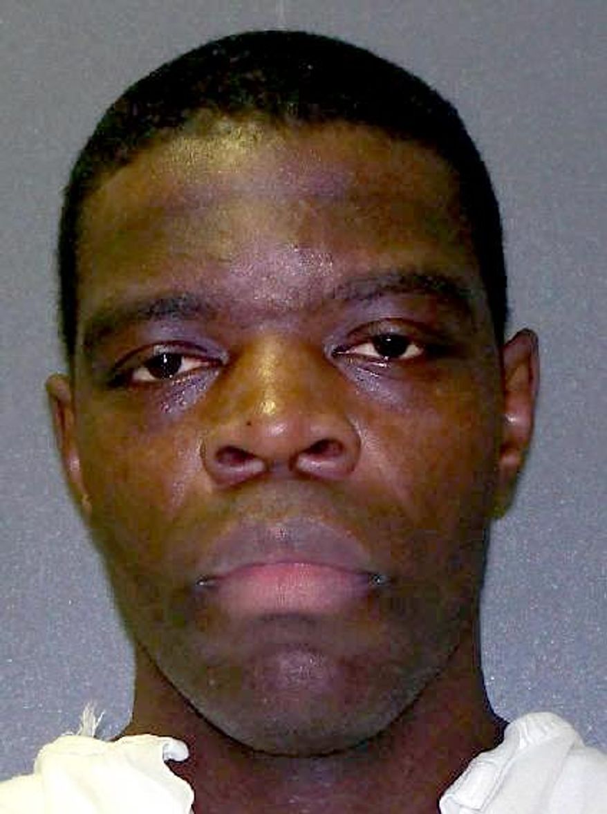 Derrick Charles is seen in this undated handout photo provided by the Texas Department of Criminal Justice. Charles faces lethal injection Tuesday evening, May 12, 2015, for the 2002 slayings of his 15-year-old girlfriend, her mother and her grandfather at their home. His lawyers argue the 32-year-old Charles is mentally incompetent for execution and they need time and court-approved money to pursue those claims. State attorneys are opposing any delay in the punishment. Charles was 19 at the time of the crime. (AP Photo/Texas Department of Criminal Justice)