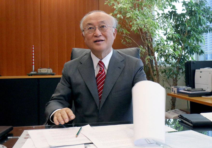 Director General of the International Atomic Energy Agency, IAEA, Yukiya Amano from Japan speaks during an interview with the Associated Press in Vienna, Austria, Tuesday, May 12, 2015. Amano said setting up a potential showdown with Iran, that his experts will have the right to push for access to Iranian military sites under an envisaged nuclear agreement between Tehran and six world powers. (AP Photo/Ronald Zak)