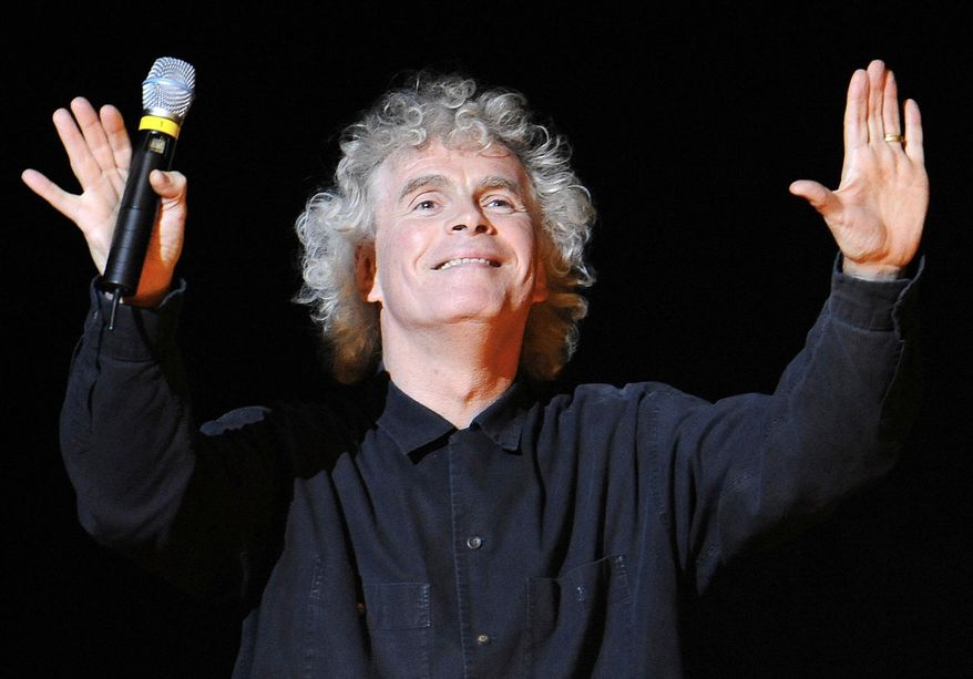 FILE - In this March 27, 2010 file photo conductor Sir Simon Rattle gestures prior to a dress rehearsal for Richard Wagner's opera "Goetterdaemmerung" which was part of the Salzburg Easter Festival in Salzburg, Austria. The Berlin Philharmonic said Tuesday May 12, 2015 it could take as long as a year to find a replacement for outgoing chief conductor Simon Rattle after the orchestra’s musicians were unable to agree upon a candidate. The orchestra said Tuesday that 123 musicians met for more than 11 hours Monday behind closed doors in a church in Berlin’s upscale Dahlem neighborhood and held many votes but couldn’t get the majority needed to elect a successor to Rattle, who leaves in 2018. (AP Photo/Kerstin Joensson)