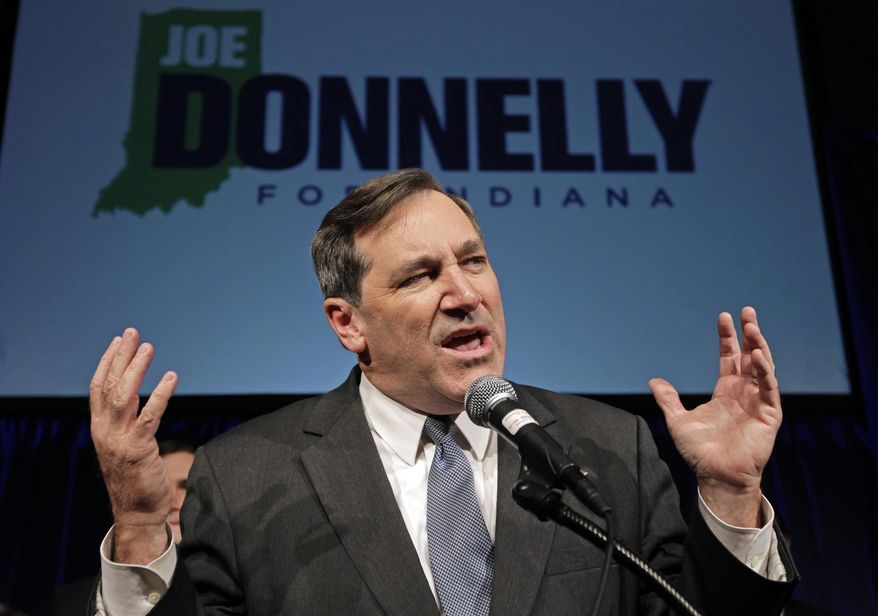 Sen. Joe Donnelly, Indiana Democrat, defended his vote against Supreme Court Justice Brett M. Kavanaugh by saying he voted "yes" on Neil Gorsuch's confirmation to the Supreme Court and on 77 percent of Mr. Trump's judicial nominees. (Associated Press/File)