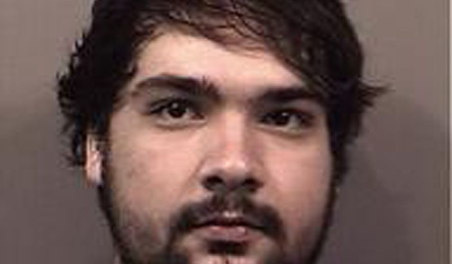 This May 11, 2015 police booking photo shows Kyler L. Myers of Greenwood, Ind., who is charged with two counts of Possession of Paraphernalia and one count of Disorderly Conduct by the Greenwood Police Department. State police say the 19-year-old central Indiana man who died in police custody after being found unconscious in the back of a jail transport van was being taken to a hospital for an evaluation after he became "increasingly agitated." (Indiana State Police via AP)