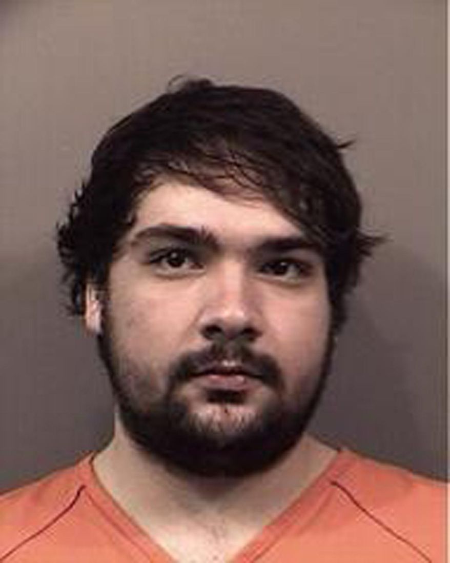 This May 11, 2015 police booking photo shows Kyler L. Myers of Greenwood, Ind., who is charged with two counts of Possession of Paraphernalia and one count of Disorderly Conduct by the Greenwood Police Department. State police say the 19-year-old central Indiana man who died in police custody after being found unconscious in the back of a jail transport van was being taken to a hospital for an evaluation after he became "increasingly agitated." (Indiana State Police via AP)