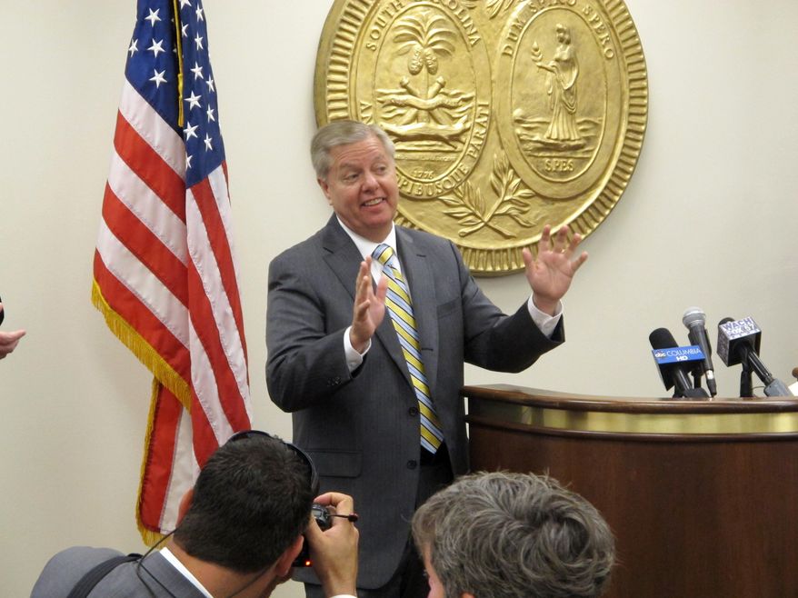 Republican U.S. Sen. Lindsey Graham visits the South Carolina Statehouse on Tuesday, May 12, 2015, in Columbia, S.C. Graham was a state House member for two years at the start of his political career in 1993. Graham gave a speech for his expected presidential bid. He said he's 99.9 percent sure he will run. (AP Photo/Jeffrey Collins)