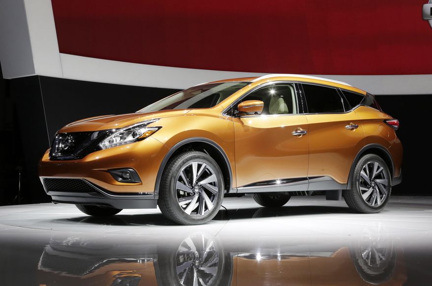 FILE - In this April 16, 2014 file photo, the 2015 Nissan Murano SUV is introduced at the New York International Auto Show, in New York. Only three of seven midsize SUVs from the 2015 model year performed well in front-end crash tests done by an insurance industry group. The Nissan Murano and Jeep Wrangler four-door got the highest, or "good," rating in the latest round of Insurance Institute for Highway Safety small overlap crash tests. (AP Photo/Mark Lennihan, File)