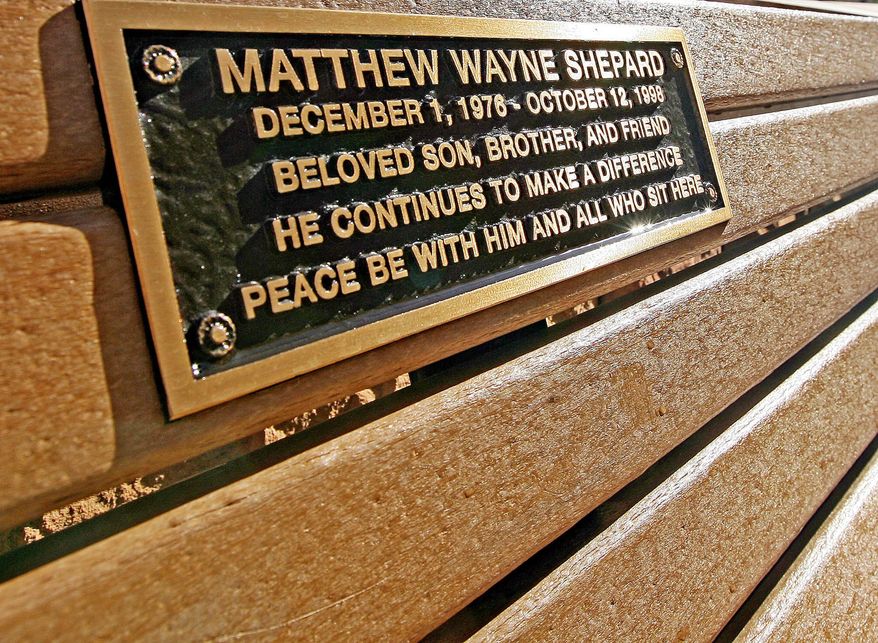 FILE - This Sept. 26, 2008 file photo shows a bench in front of the University of Wyoming Arts & Sciences building with a memorial plaque in honor of the late Matthew Shepard in Laramie, Wyo. The Laramie City Council considers the state's first anti-discrimination ordinance on Wednesday, May 13, 2015 that would ban employers as well as public facilities such as restaurants from discriminating against people on the basis of sexual orientation/identity. The Matthew Shepard Foundation, based in Denver, applauds the move, noting that much has changed since the UW undergrad was killed in Laramie in 1998. (AP Photo/Laramie Boomerang, Andy Carpenean, File)