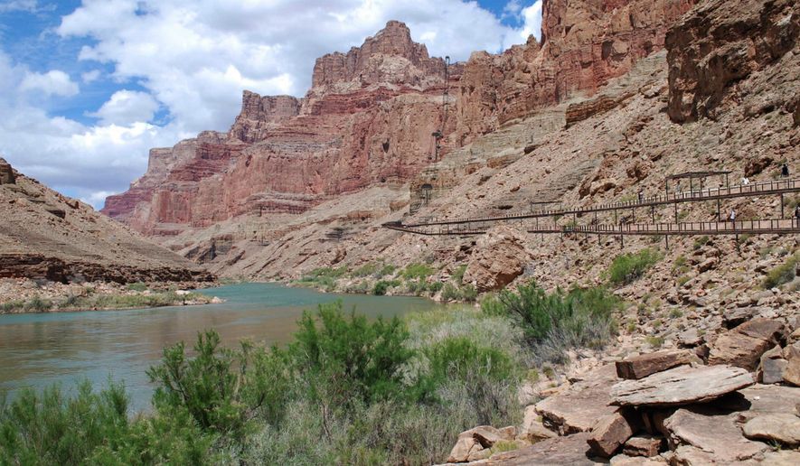 This undated image provided by Confluence Partners LLC., shows a proposed aerial tram and boardwalk at the east rim of the Grand Canyon on the Navajo Nation. The Navajo Nation's newly inaugurated president surprised many when he signed an agreement that included plans to build a tram that takes visitors to the bottom of the Grand Canyon. (Confluence Partners LLC. via AP)
