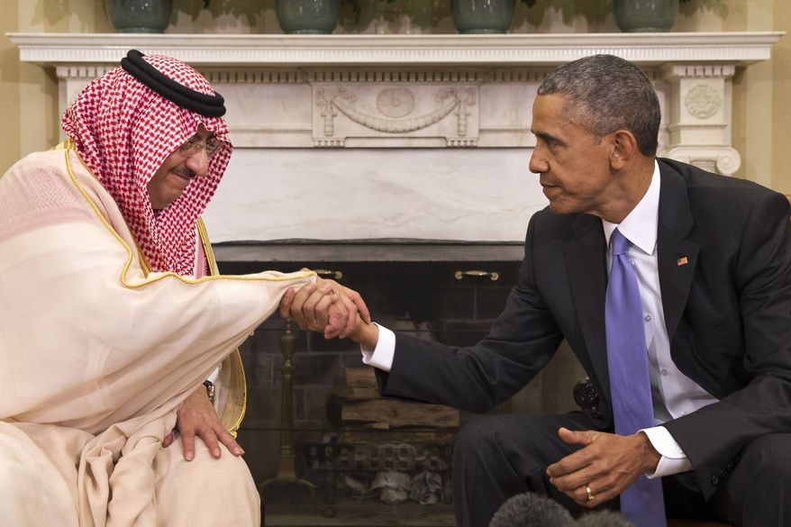 President Barack Obama shakes hands with Saudi Arabia&#x27;s Crown Prince Mohammed bin Nayef during their meeting in the Oval Office of the White House in Washington, Wednesday, May 13, 2015.  (AP Photo/Jacquelyn Martin)