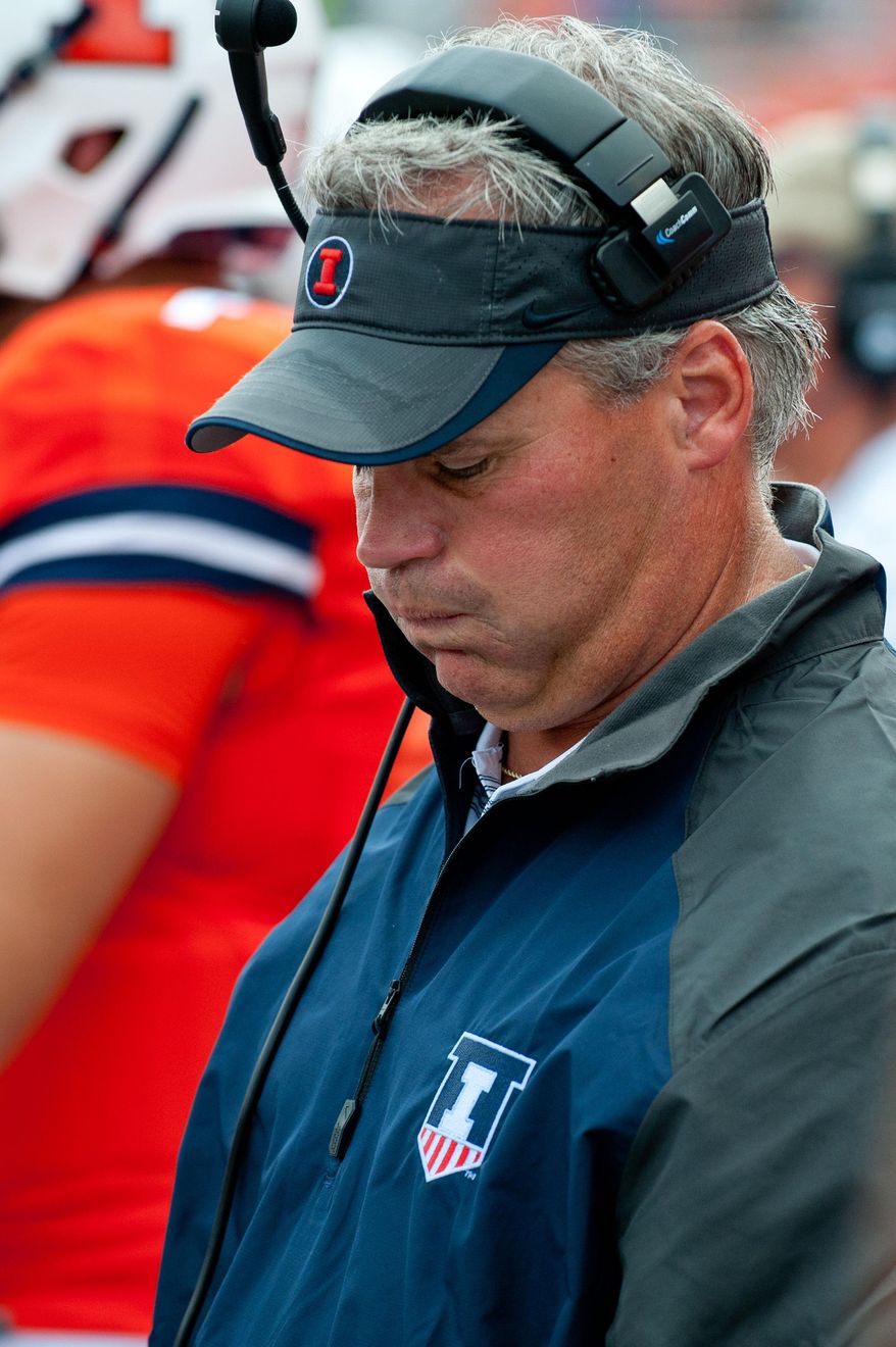 FILE - In this Aug. 30, 2014, file photo, Illinois head coach Tim Beckman reacts on the sideline during the third quarter of an NCAA college football game against Youngstown State in Champaign, Ill. A national advocacy group for college football players says complaints about Illinois coach Tim Beckman&#39;s handling of a former player&#39;s injuries should be investigated by someone outside the university. (AP Photo/Bradley Leeb, File)