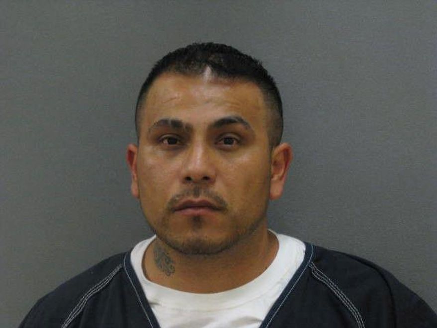 This undated photo provided by the Carver County, Minn., Sheriff’s Office shows Reinol Godines Vergara. Vergara and Edson Celin-Dominguez Benitez went to rob 90-year-old Earl Olander at his rural Carver County farm home last month because they knew he'd be an easy target, but police caught up with the defendants after a citizen found savings bonds in Olander's name while cleaning out one defendant's former apartment, according to charges filed Wednesday, May 13, 2015. Vergara, 35, of Richfield, was charged with two counts of second-degree murder. (Carver County Sheriff’s Office via AP)