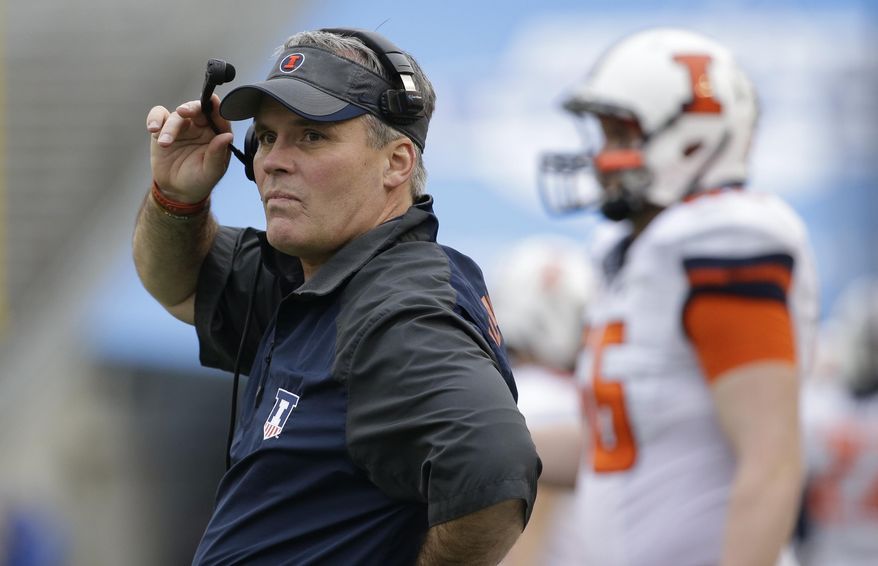 FILE - In this Dec. 26, 2014, file photo, Illinois head coach Tim Beckman watches from the sidelines during the first half of the Heart of Dallas Bowl NCAA college football game against Louisiana Tech in Dallas. A national advocacy group for college football players says complaints about Illinois coach Tim Beckman&#39;s handling of a former player&#39;s injuries should be investigated by someone outside the university. National College Players Association Executive(AP Photo/LM Otero, File)