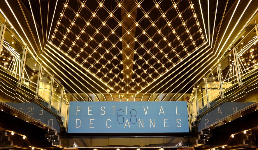 A sign for the 68th international film festival inside the Palais des Festivals, Cannes, southern France, Wednesday, May 13, 2015. The festival opens on Wednesday and runs until Sunday, May 24. (AP Photo/David Azia)