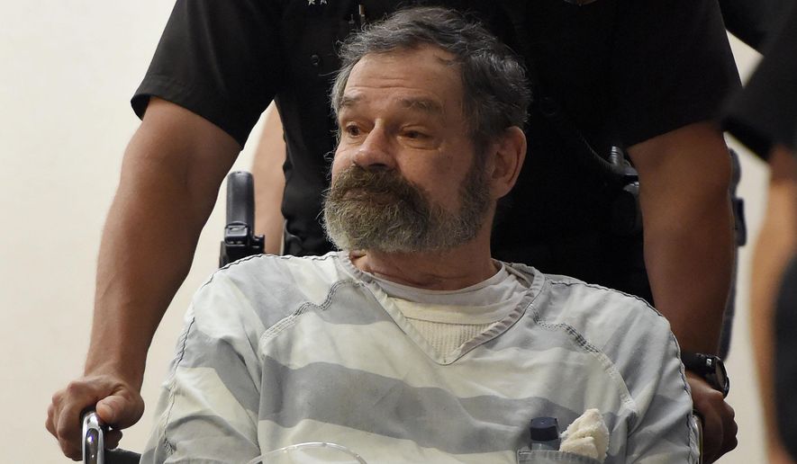 Frazier Glenn Miller is brought to court for an appearance on Thursday, May 14, 2015, at the Johnson County Courthouse in Olathe, Kan. Miller is charged with capital murder in April 13, 2014, shooting deaths of 69-year-old William Lewis Corporon, 14-year-old Reat Griffin Underwood and 53-year-old Terri LaMano in Overland Park, Kansas. (John Sleezer/The Kansas City Star via AP)