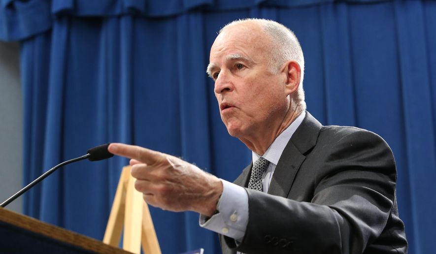 California Gov. Jerry Brown responds to a question concerning his revised state budget plan during a news conference at the Capitol in Sacramento, Calif., Thursday May 14, 2015. Brown&#39;s $115.3 billion spending plan would send billions more to public schools and freeze in-state undergraduate tuition and establish a new state tax credit of the working poor.(AP Photo/Rich Pedroncelli)
